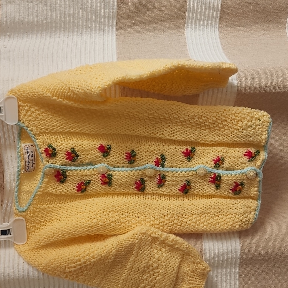 Hand knit baby sweater